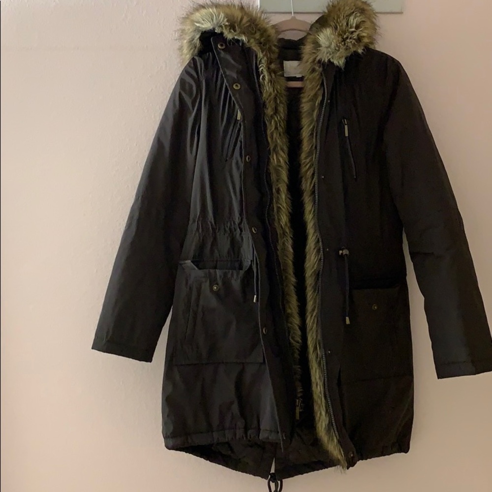 Dark brown coat with faux fur trimming on hat